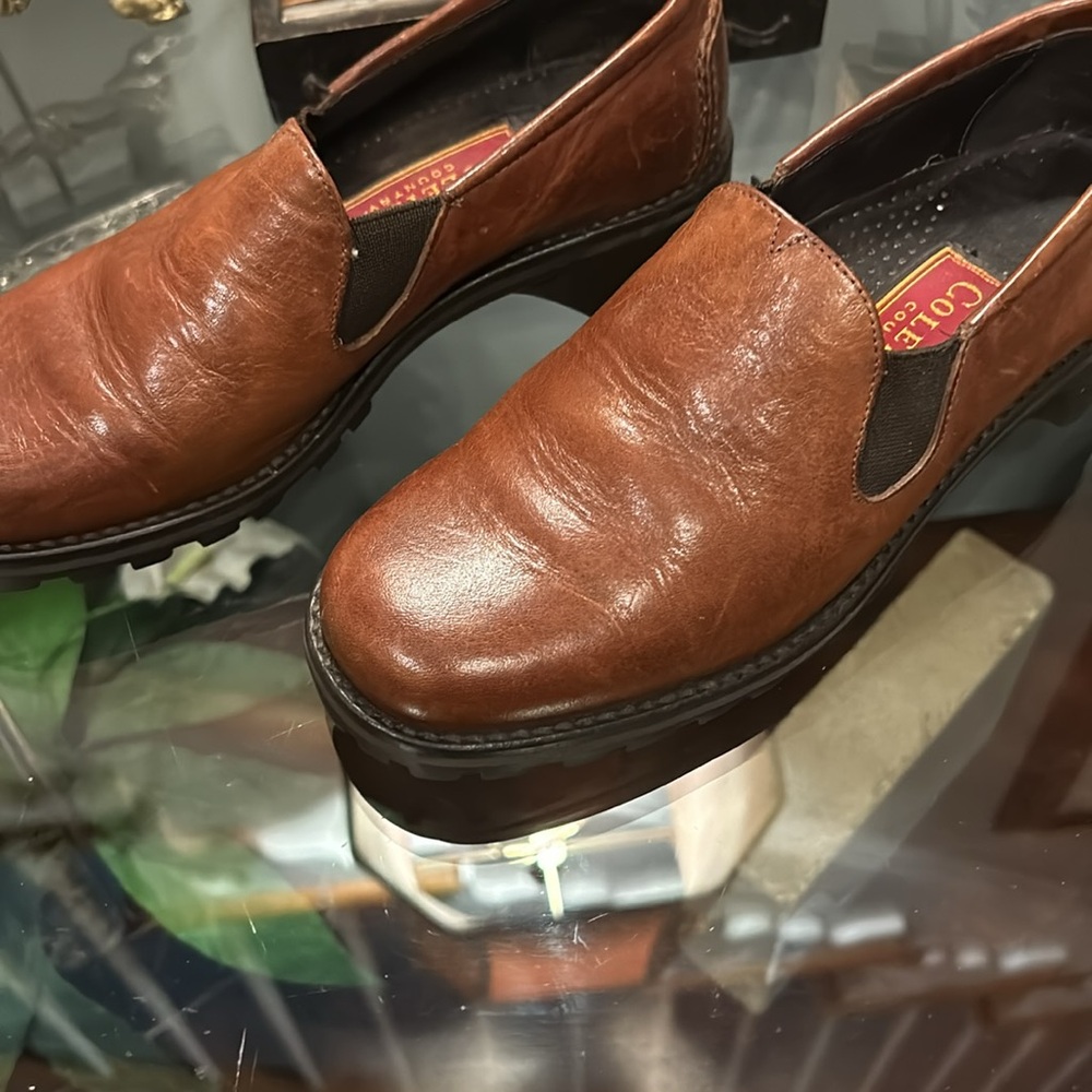 Cole Haan slide on loafer with mud grip soles. GUC